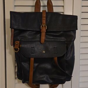 Vintage-Inspired Black and Brown Roll-Top Backpack